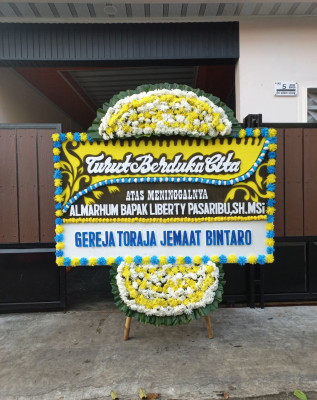 Papan Bunga Duka di Sambi
